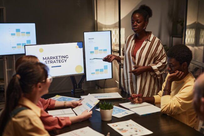 black woman presenting plan at meeting 2023 11 27 05 11 32 utc 1 min