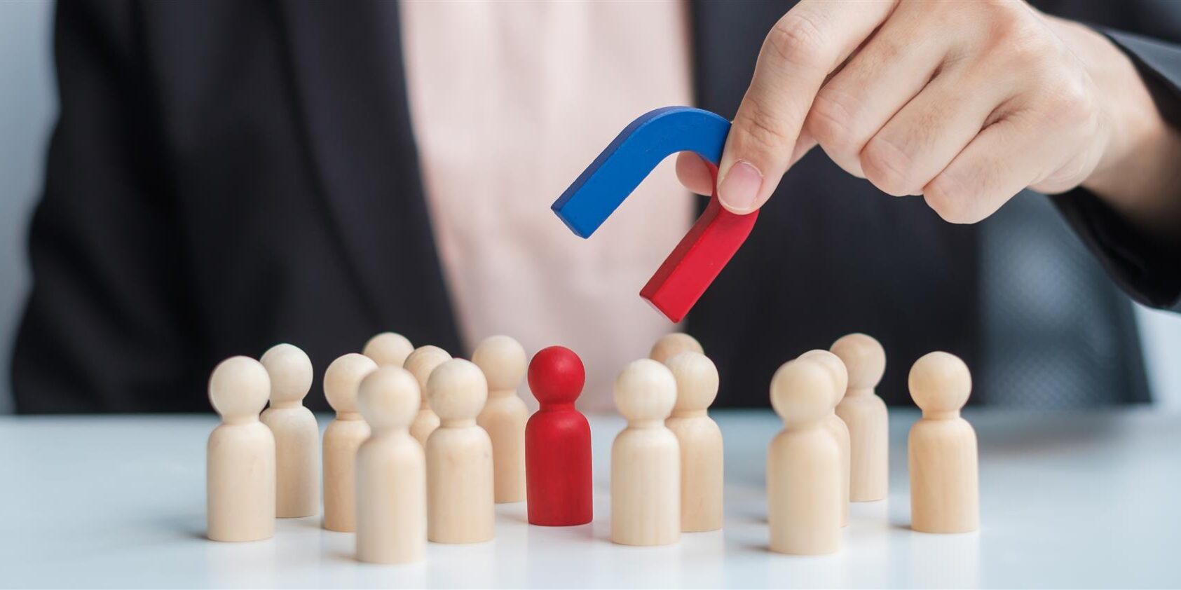 business woman hand holding magnet and pulling man 2025 03 08 06 57 42 utc