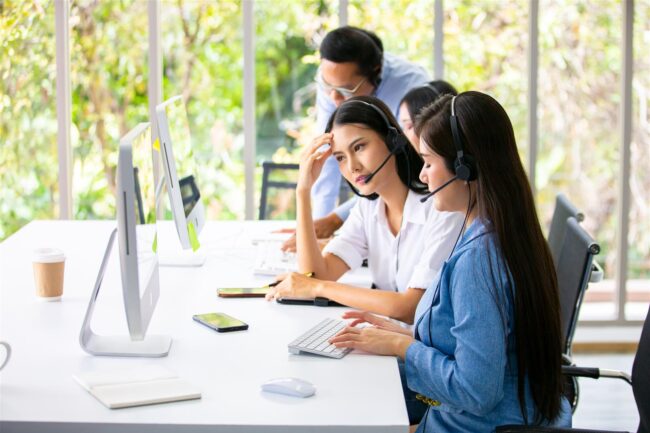 female customer services agent working at desk in 2025 02 03 09 30 45 utc