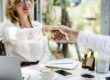 business handshake at cafe during daytime meeting 2026 03 18 11 10 22 utc