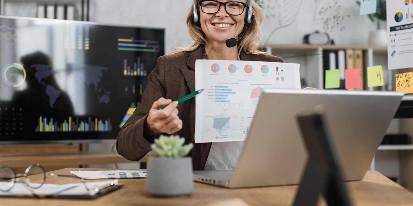 businesswoman presents data charts with headset at 2026 03 16 03 24 10 utc