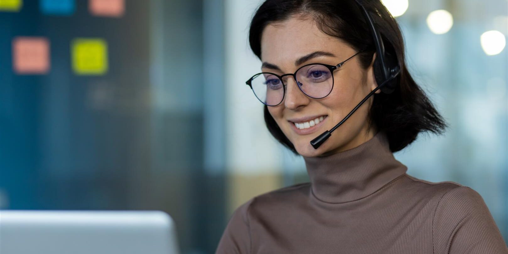 smiling young woman working with a headset 2026 03 24 21 49 59 utc
