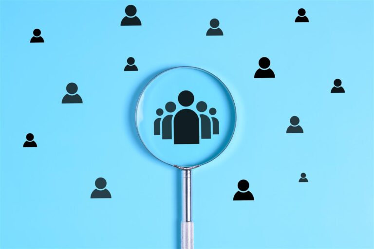 magnifying glass showing team of people pictogram 2026 03 25 10 18 50 utc