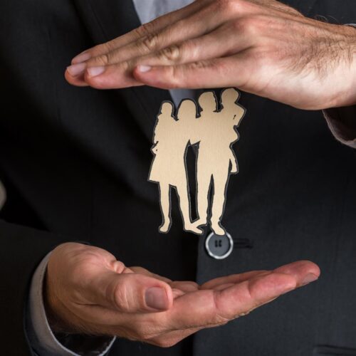 insurance agent making protecting gesture around a 2025 02 18 12 59 21 utc insurance agent making protecting gesture around a 2025 02 18 12 59 21 utc